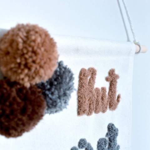 Beginners Needlefelting onto a Cotton Banner